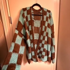 Brown and blue checkered sweater